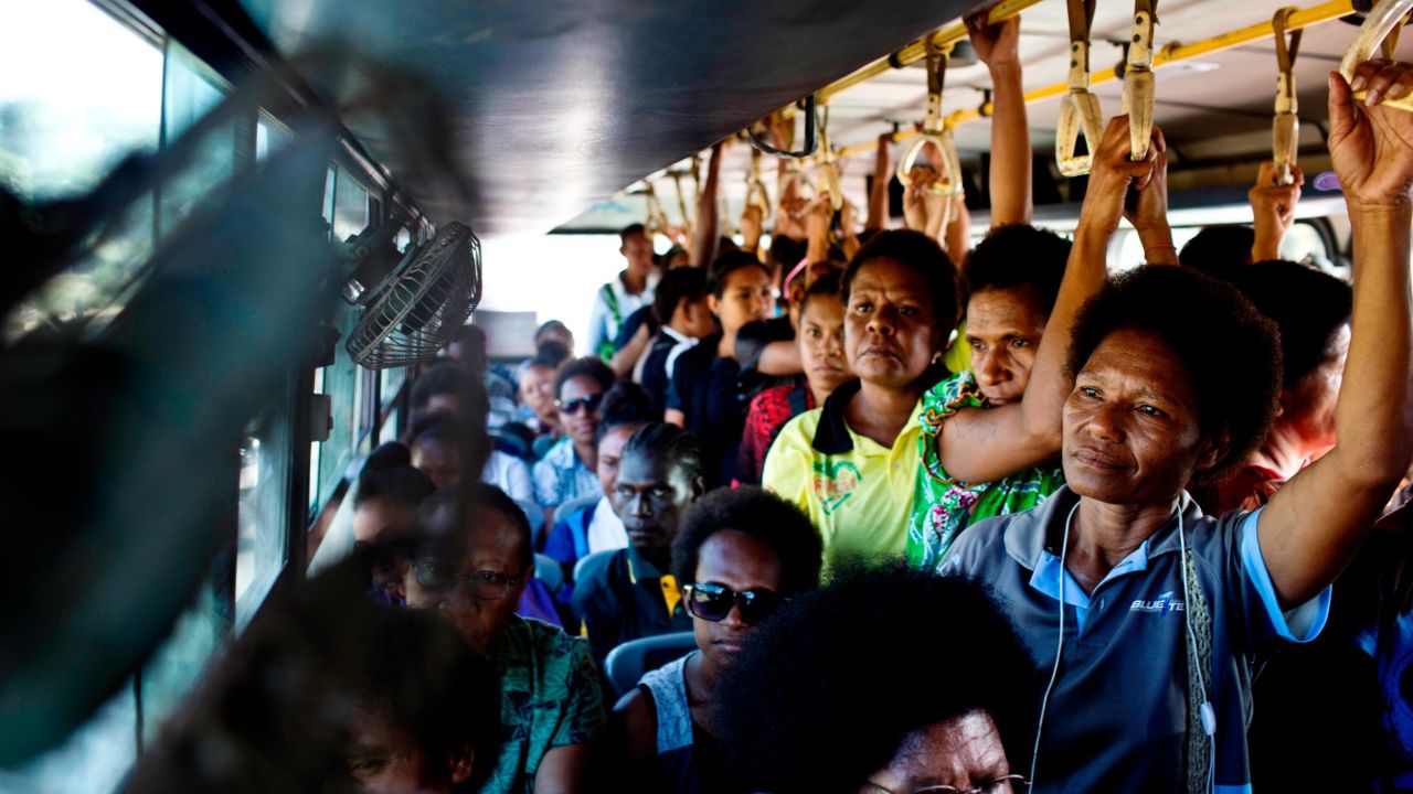 Women ride on a woman-only bus to work that is supported by UN Women as part of a program to reduce violence against women in Port Moresby, Papua New Guinea, on February 26, 2019.