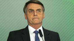 Brazilian President Jair Bolsonaro gives a statement in Brasilia on January 25, 2019 after the collapse of a dam near Brumadinho in southeastern Brazil. - A dam collapse in southeastern Brazil unleashed a torrent of mud on a riverside town and surrounding farmland Friday, destroying houses, leaving 200 people missing and raising fears of a number of deaths, according to officials. The dam belonged to Brazilian mining giant Vale. (Photo by Sergio LIMA / AFP)        (Photo credit should read SERGIO LIMA/AFP/Getty Images)