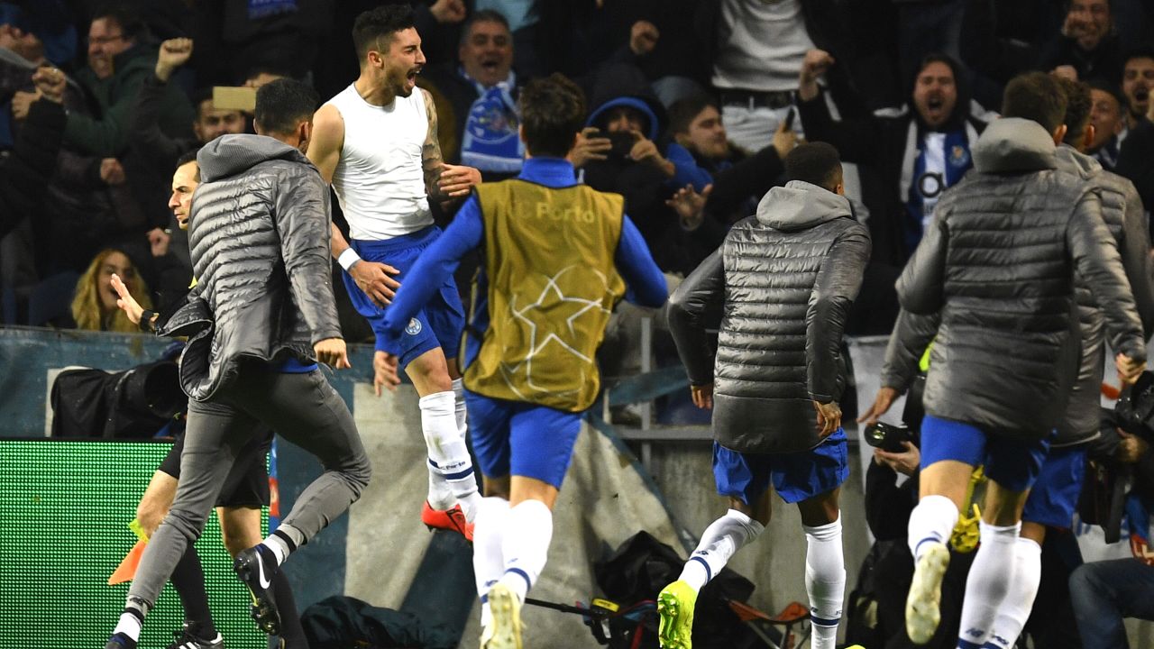 Porto celebrates Alex Telles 117th-minute winner.