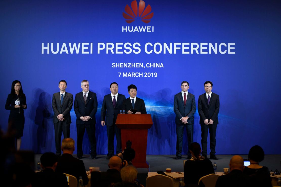 Huawei Deputy Chairman Guo Ping, center, announcing a lawsuit against the US government on Thursday.