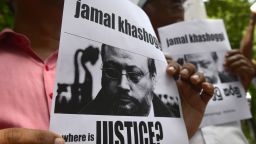 Members of the Sri Lankan web journalist association hold placards with the image of Saudi journalist Jamal Khashoggi during a demonstration outside the Saudi Embassy in Colombo on October 25, 2018, following Khashoggi's dissapearance on October 2 at the Saudi consulate in Istanbul. - Saudi Arabia's crown prince denounced the "repulsive" murder of journalist Jamal Khashoggi and vowed justice will prevail, in his first public comments on the case, without addressing US accusations of a monumental cover-up. (Photo by LAKRUWAN WANNIARACHCHI / AFP)        (Photo credit should read LAKRUWAN WANNIARACHCHI/AFP/Getty Images)