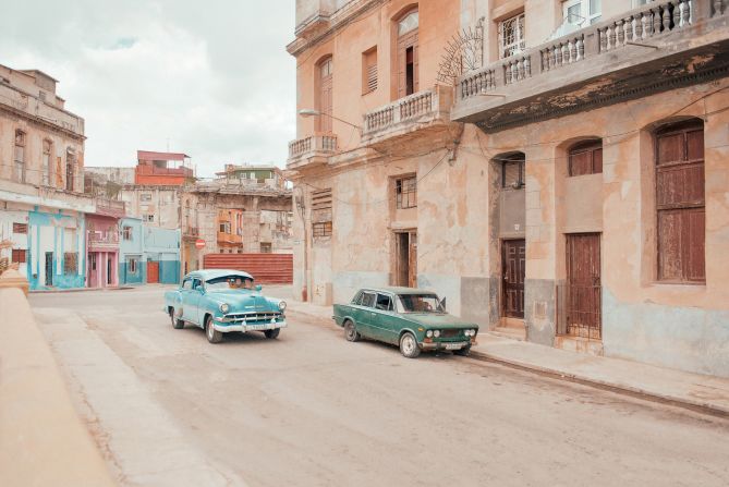 Vintage cars, a common sight in Havana, appear in many of the French photographer's images.