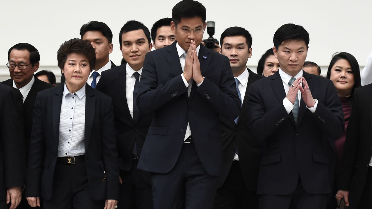 Thai Raksa Chart party leader Preechaphol Pongpanich with other officials before the Constitutional Court ruled to dissolve the party in Bangkok on March 7, 201.