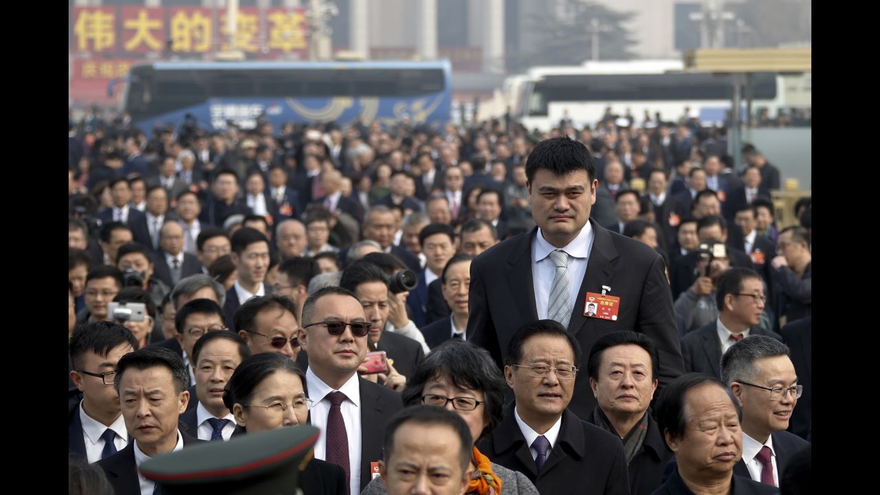 Hall of Fame basketball player Yao Ming towers above other delegates who were attending the Chinese People's Political Consultative Conference in Beijing on Sunday, March 3.