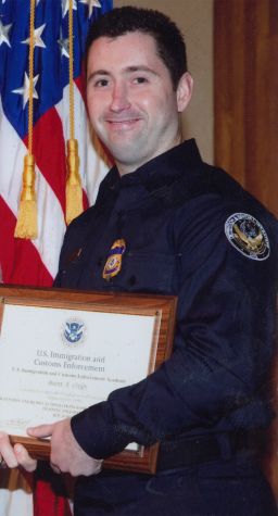 Brent Oxley, who was fired from ICE in part for improperly signing detention warrants, at his graduation from the ICE Academy in Georgia, in January 2010.
