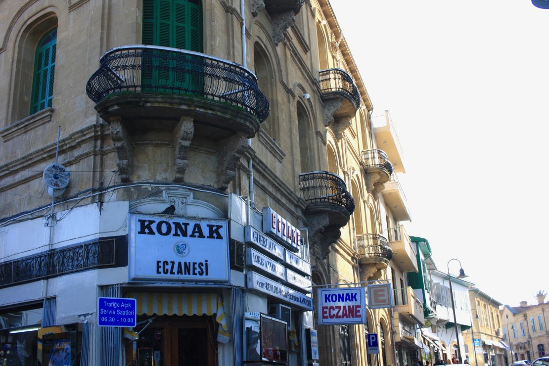 Historic architecture flanks the buffer zone on both sides of Nicosia, with Greek signs giving way to Turkish ones when crossing from south to north. 