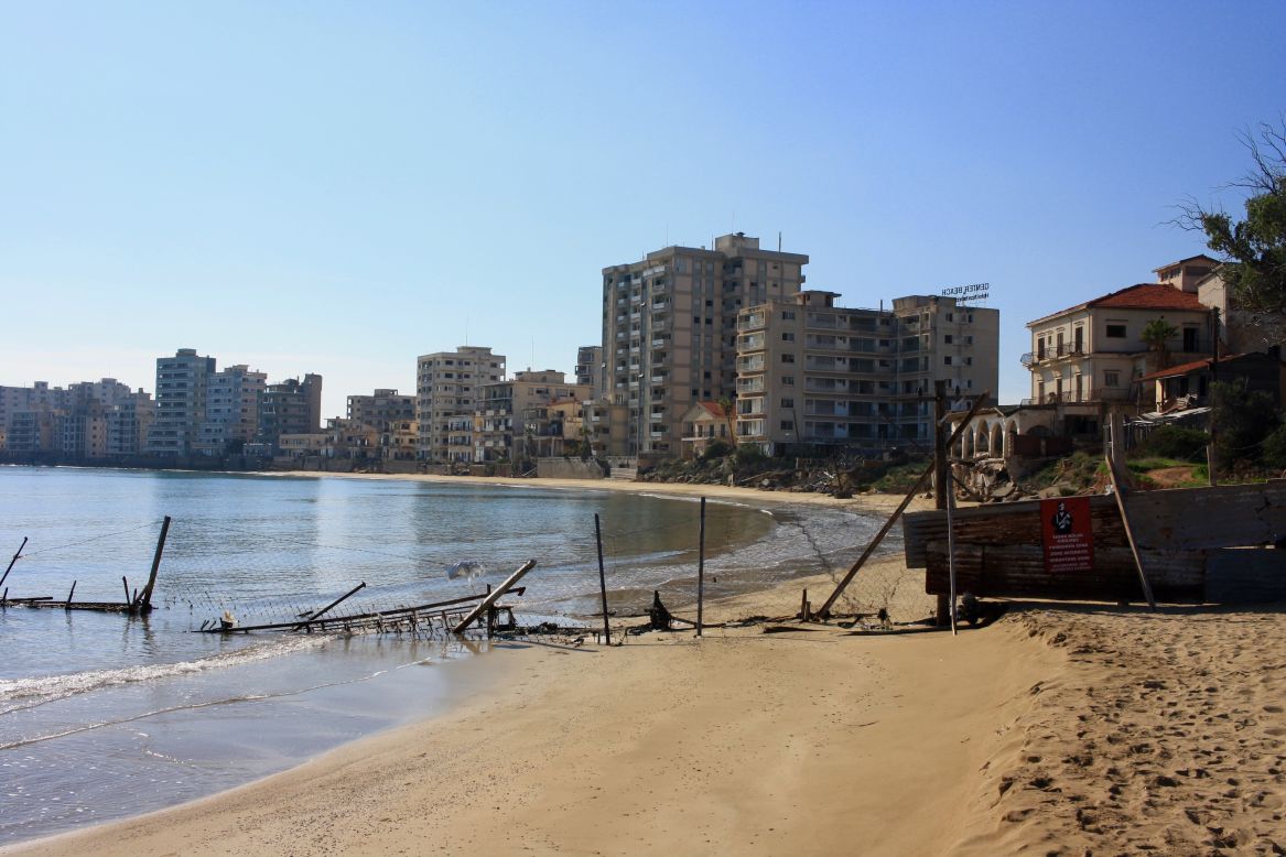 <strong>Beach border fence. </strong>Once a glamorous destination for beach vacations, the resort city of Varosha is now a ghost town with Mediterranean views. 