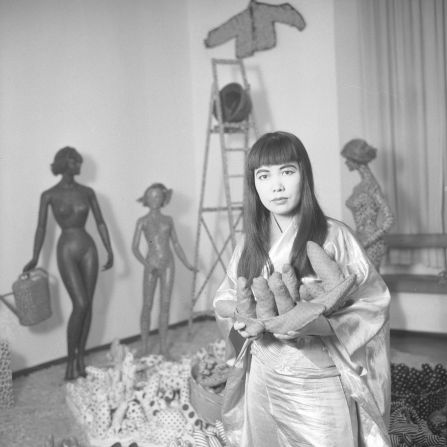Kusama pictured with her work in Milan in 1966.