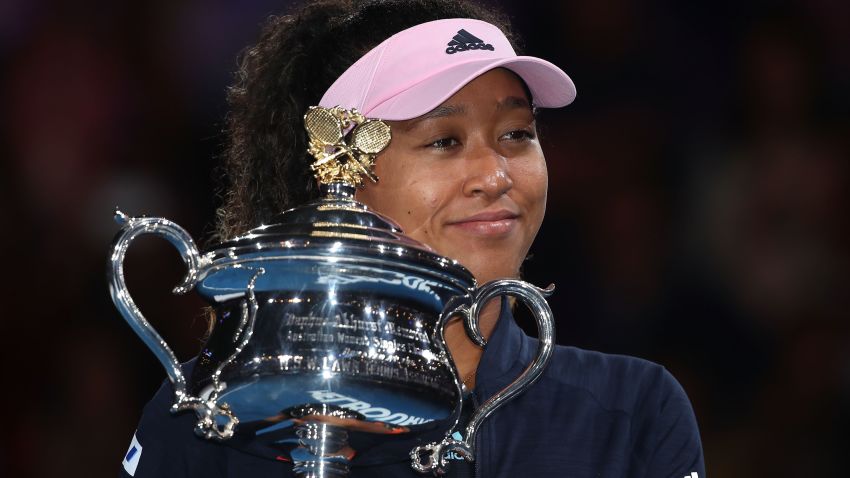 MELBOURNE, AUSTRALIA - JANUARY 26: Naomi Osaka of Japan poses for a photo with the Daphne Akhurst Memorial Cup following victory in her Women's Singles Final match against Petra Kvitova of the Czech Republic during day 13 of the 2019 Australian Open at Melbourne Park on January 26, 2019 in Melbourne, Australia. (Photo by Mark Kolbe/Getty Images)