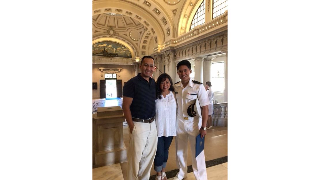 Nick Paraiso, co-host of the "Thank You For Your Service" podcast, with his parents at the US Naval Academy.