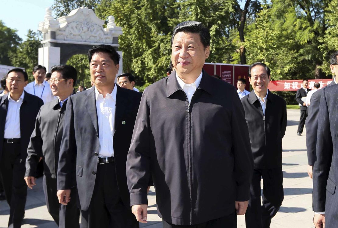 Xi Jinping wears a windbreaker to an event held at Beijing's China Agricultural University in September 2012.