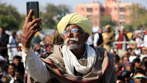 A farmer takes a selfie during a rally for Congress Party leader Rahul Gandhi in January.