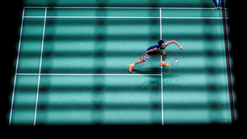 Kento Momota of Japan plays a shot during his second round match against Kantaphon Wangcharoen of Thailand on day two of the Yonex All England Open on Thursday, March 7 in Birmingham, England.