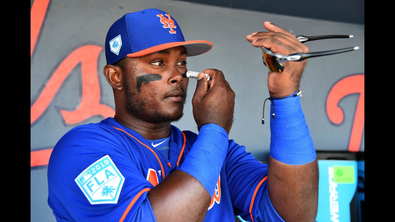 New York Mets second baseman Dilson Herrera applies eyeblack prior to the spring training game against the Houston Astros on Monday, March 4, in West Palm Beach, Florida.