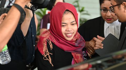 Indonesian national Siti Aisyah (C) smiles while leaving the Shah Alam High Court, outside Kuala Lumpur on March 11, 2019 after a prosecutor withdrew a murder charge against her for her alleged role in the assassination of Kim Jong Nam, the half-brother of North Korean leader Kim Jong Un. (MOHD RASFAN/AFP/Getty Images)