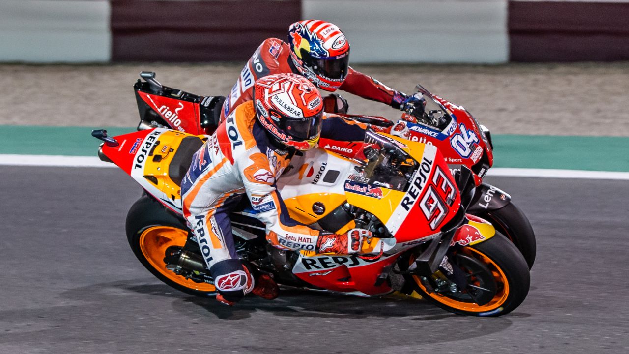 Dovizioso and Marquez go wheel-to-wheel in a thrilling race in Qatar.