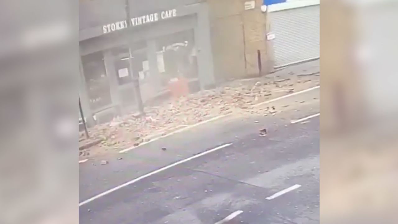 Bricks crashed onto the pavement in Stoke Newington High Street moments after a man walked by.