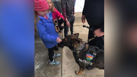 Emma Mertens was excited to meet nearly 40 police dogs who showed up on her doorstep on Saturday morning.