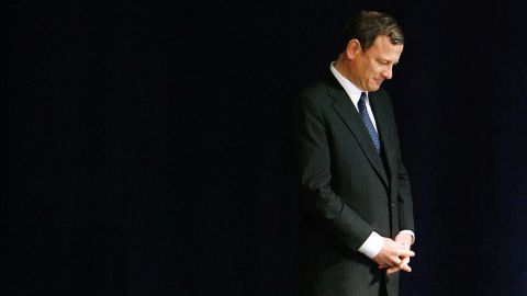 In this April 11, 2008, file photo, Chief Justice John Roberts prepares to take the stage to address the dedication ceremony during the grand opening of the Newseum in Washington.