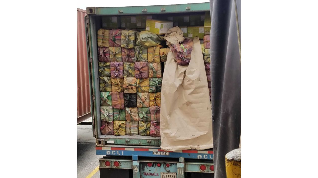 The cocaine was discovered in packages placed for easy removal from container.
