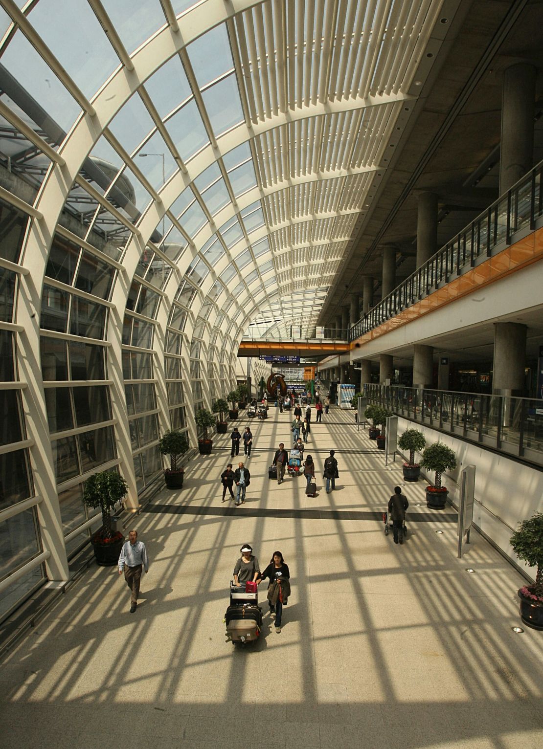 Passengers departing Chek Lap Kok.
