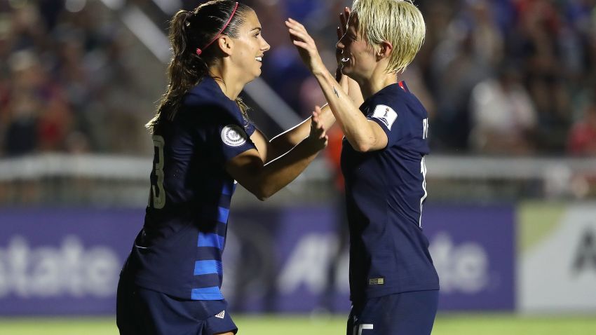 CARY, NC - OCTOBER 04:  Alex Morgan #13 and Megan Rapinoe #15 of USA celebrate after a goal against Mexico during the Group A - CONCACAF Women's Championship at WakeMed Soccer Park on October 4, 2018 in Cary, North Carolina.  (Photo by Streeter Lecka/Getty Images)