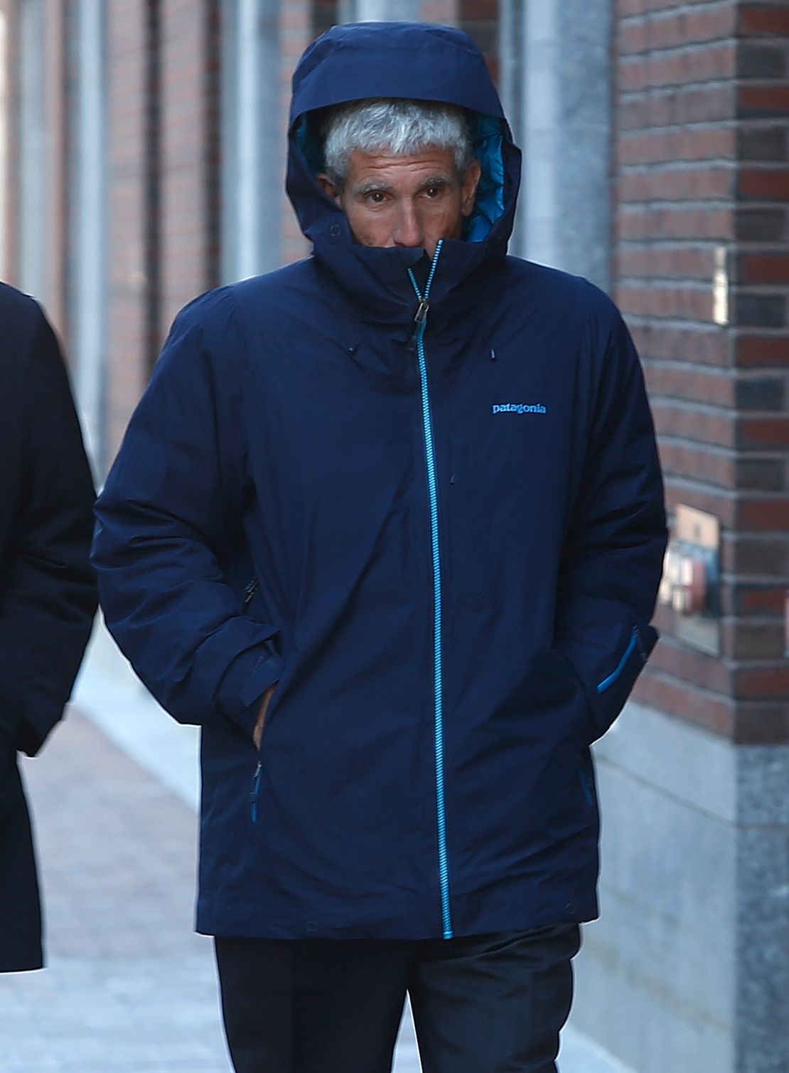 Rick Singer walks into the John Joseph Moakley United States Courthouse in Boston on Tuesday.