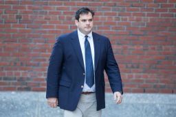 Stanford University sailing coach John Vandemoer arrives at Boston Federal Court for an arraignment on March 12, 2019.