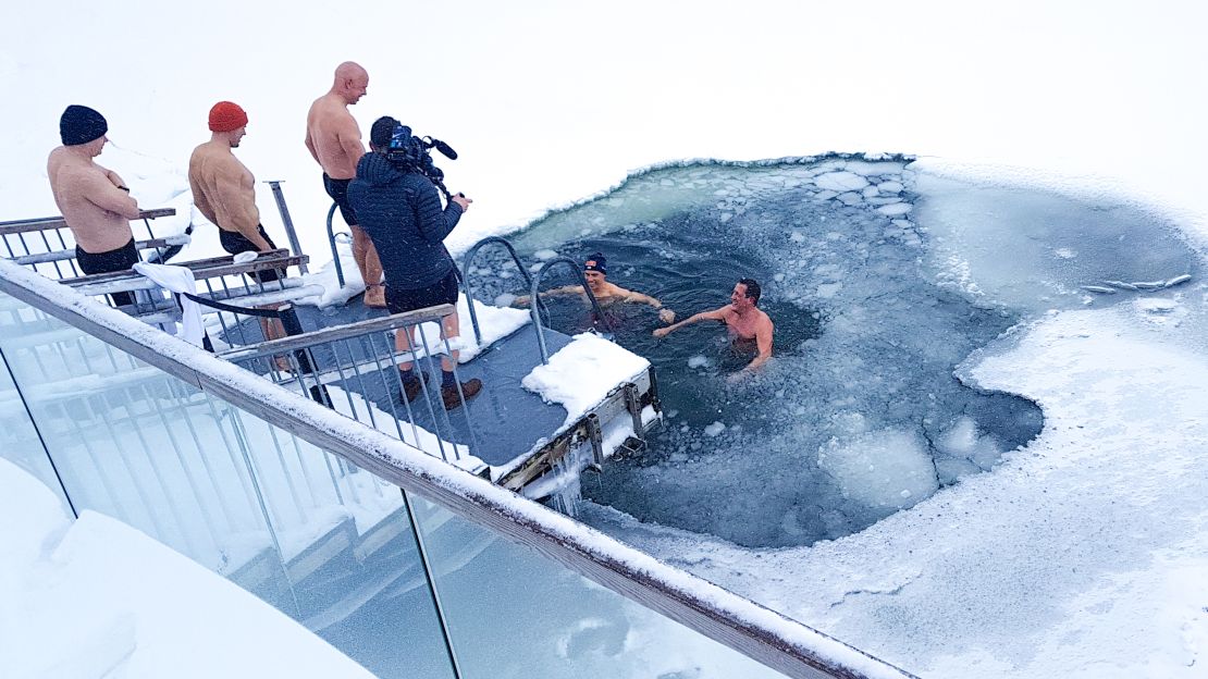 Richard Quest and Alexander Stubb go ice swimming.