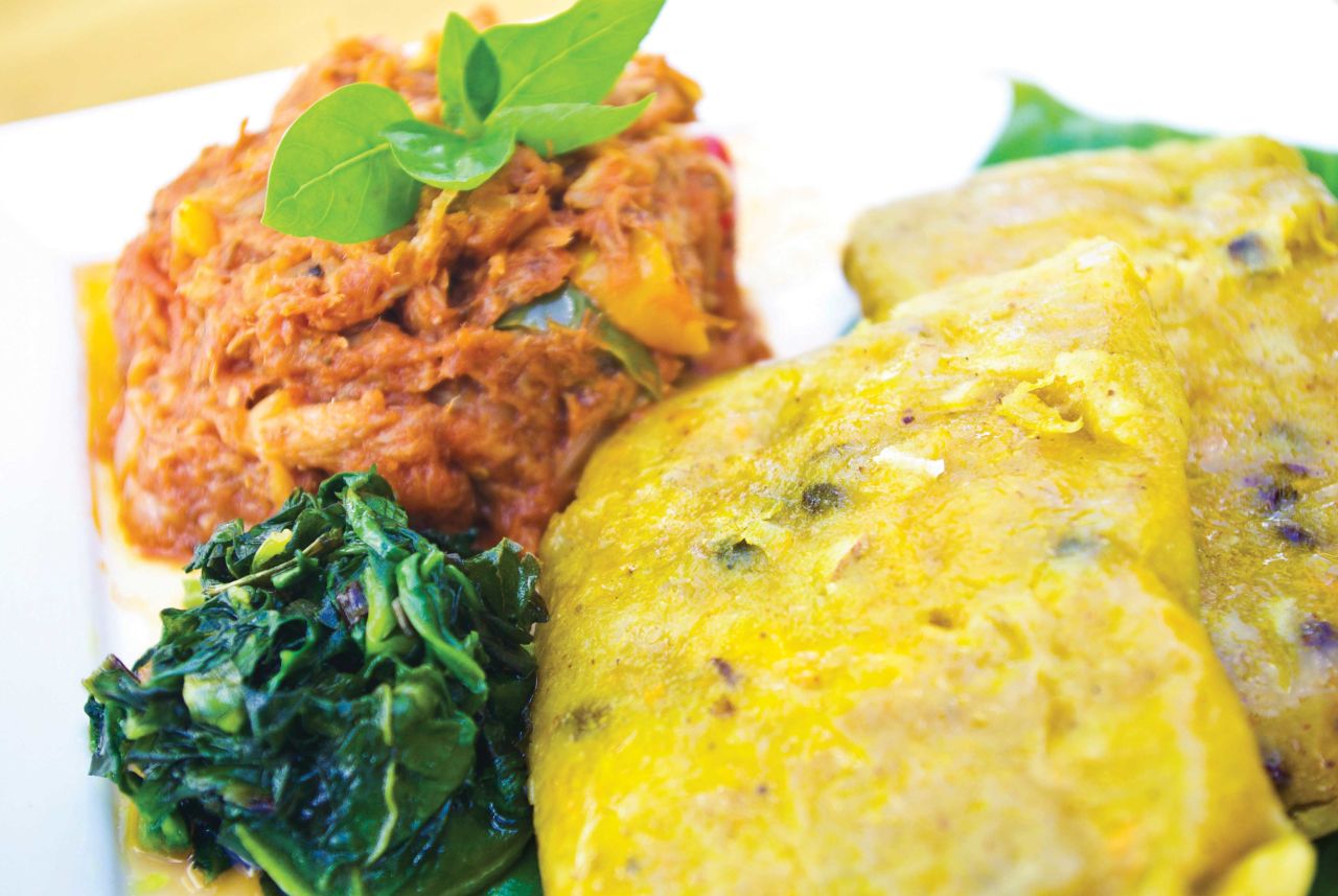 <strong>Ducana and saltfish: </strong>Ducana, a boiled sweet potato dumpling, can be served with saltfish for a hearty meal. It's a popular local starch.