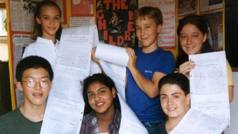 June 1995, and early efforts at advocacy work against child labor. Craig Kielburger (back row, center) with some of the original members of WE, who gathered 3,000 signatures.