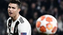 Juventus' Portuguese forward Cristiano Ronaldo eyes the ball during the UEFA Champions League round of 16 second-leg football match Juventus vs Atletico Madrid on March 12, 2019 at the Juventus stadium in Turin. (Photo by Marco BERTORELLO / AFP)        (Photo credit should read MARCO BERTORELLO/AFP/Getty Images)