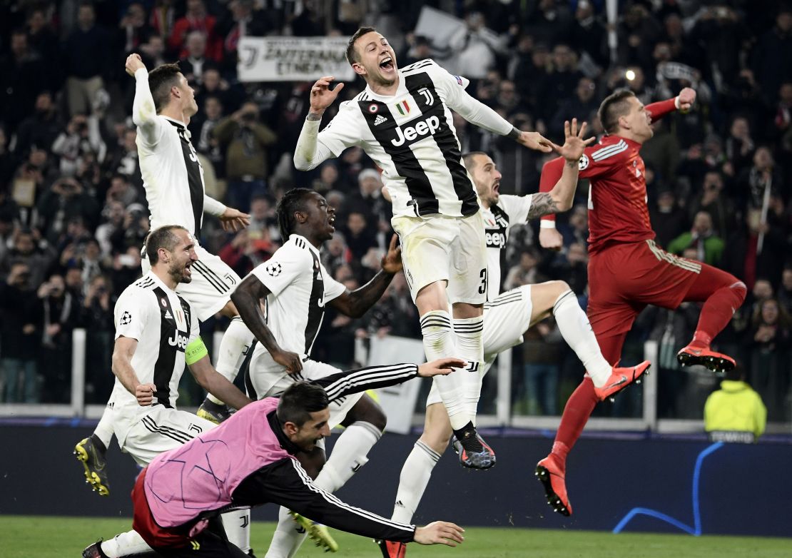 Juventus players celebrate after beating Atletico Madrid to progress to the Champions League quarterfinals. 