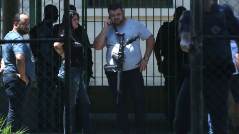 Police officers at the Raul Brasil school in Suzano, Brazil, after a shooting Wednesday.