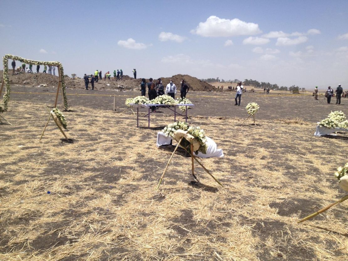 Tributes and offerings for the victims of Ethiopian Airlines flight 302 are seen at the crash site. 