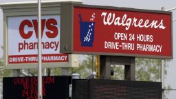 A Walgreens and CVS drugstore are seen on adjacent corners at an intersection in Calumet City, Ill., on Friday, April 30, 2004. In April, a deal to buy 1,260 Eckerd stores put CVS in the lead with total number of stores nationwide and left the two chains virtually deadlocked in sales. Despite that deal, analysts still say Walgreens is winning the drugstore war. (AP Photo/M. Spencer Green)