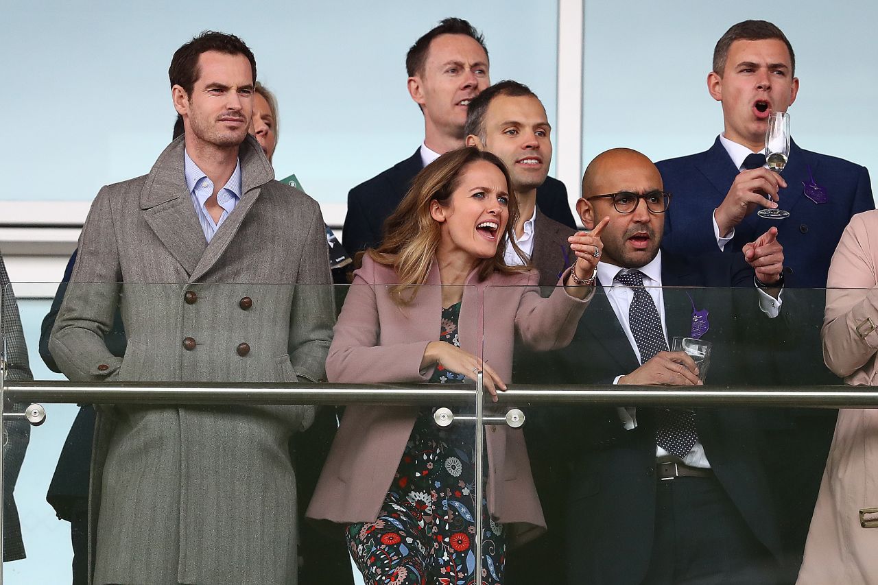 Tennis star Andy Murray and his wife Kim Murray watch the opening race on Ladies Day at the 2019 Cheltenham Festival.