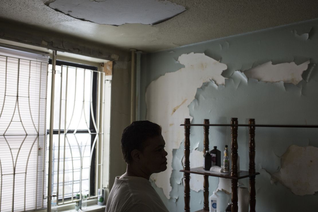 Montanez stands in her damaged apartment in Queensbridge Houses.