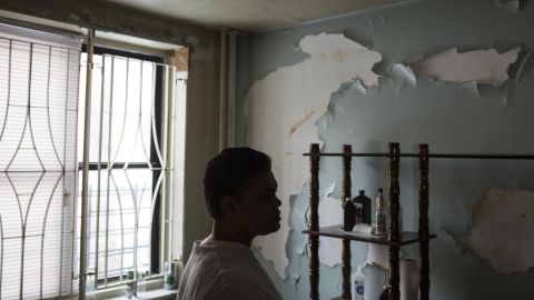 Montanez stands in her damaged apartment in Queensbridge Houses.