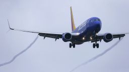 A Boeing 737 MAX 8 operated by Southwest Airlines arrives for a landing at Hobby Airport, Wednesday, March 13, 2019, in Houston. President Donald Trump issued an emergency order Wednesday grounding all Boeing 737 Max 8 aircraft in the wake of a crash of an Ethiopian airliner, a reversal for the U.S. after federal aviation regulators had maintained it had no data to show the jets are unsafe. (Yi-Chin Lee/Houston Chronicle via AP)