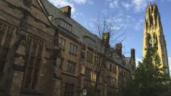 FILE - This Sept. 9, 2016 photo shows Harkness Tower on the campus of Yale University in New Haven, Conn. Dozens of people were charged Tuesday, March 12, 2019, in a scheme in which wealthy parents allegedly bribed college coaches and other insiders to get their children into some of the nation's most elite schools. The coaches worked at such schools as Yale, Wake Forest, Stanford, Georgetown, the University of Texas, the University of Southern California and the University of California, Los Angeles. A former Yale soccer coach pleaded guilty and helped build the case against others.  (AP Photo/Beth J. Harpaz, File)