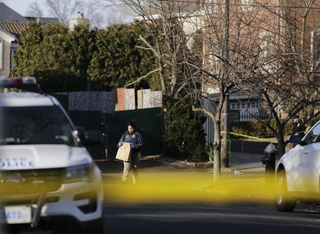 Police on Thursday work near the scene where Cali was killed on Staten Island.