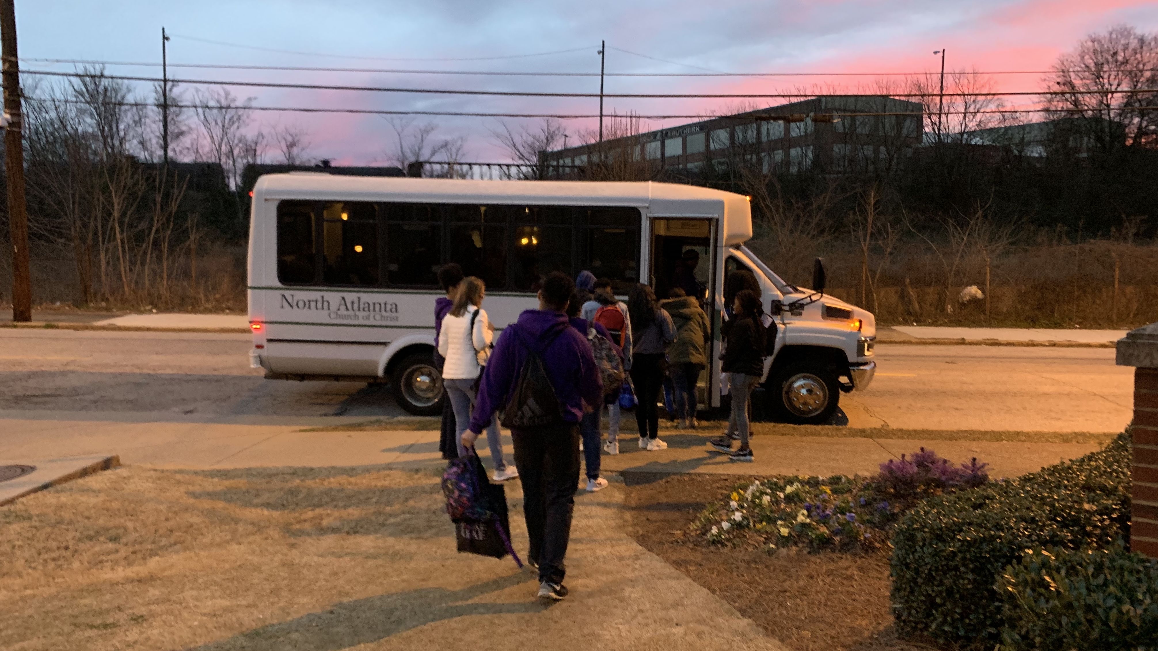 Relatives of incarcerated mothers board a bus bound for two women's prisons in Georgia.