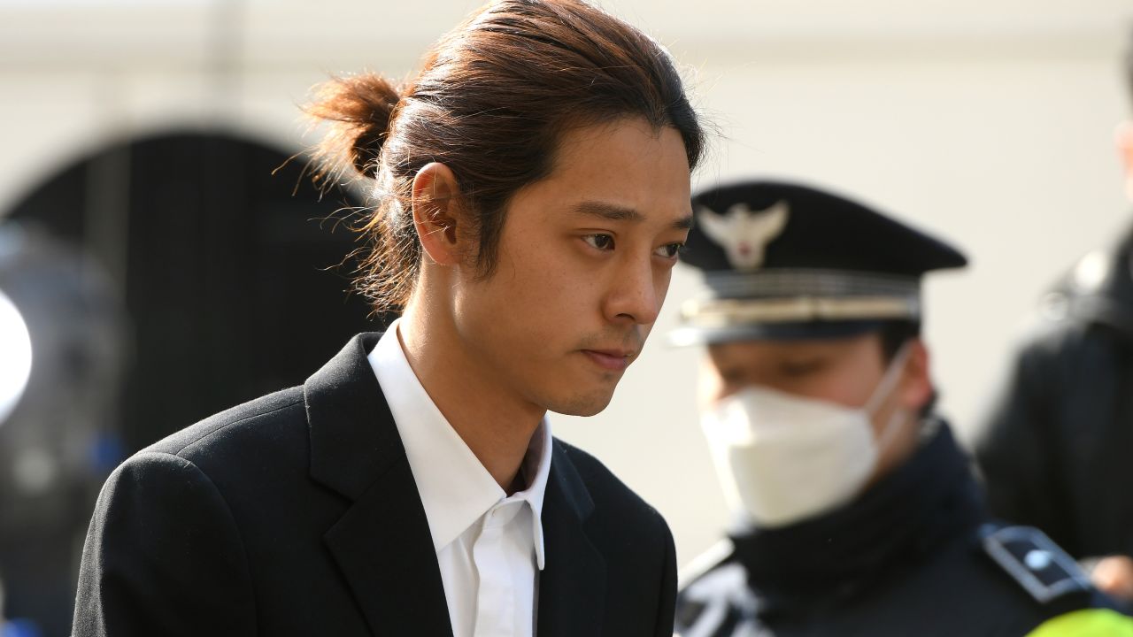 K-pop star Jung Joon-young arrives for questioning at the Seoul Metropolitan Police Agency in Seoul on March 14, 2019.