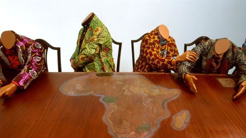 Yinka Shonibare CBE
Scramble for Africa
2003
Fourteen life-size mannequins, fourteen chairs, table, Dutch wax printed cotton
132 x 488 x 280cm
Courtesy of the artist. Collection Guggenheim Abu Dhabi
Photographer: Stephen White

