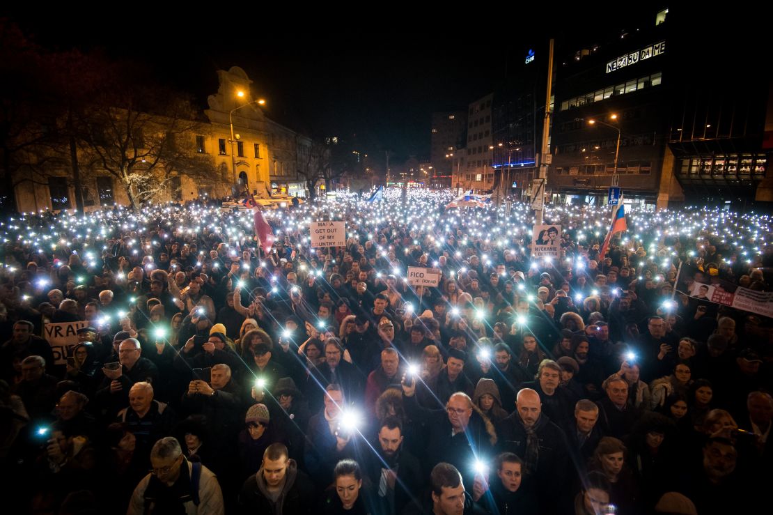 Thousands of Slovaks attend a protest in Bratislava on the first anniversary of the murder.