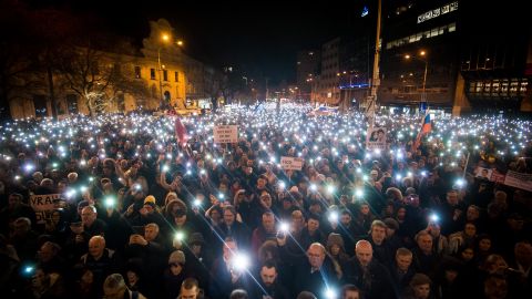 Thousands of Slovaks attend a protest in Bratislava on the first anniversary of the murder.