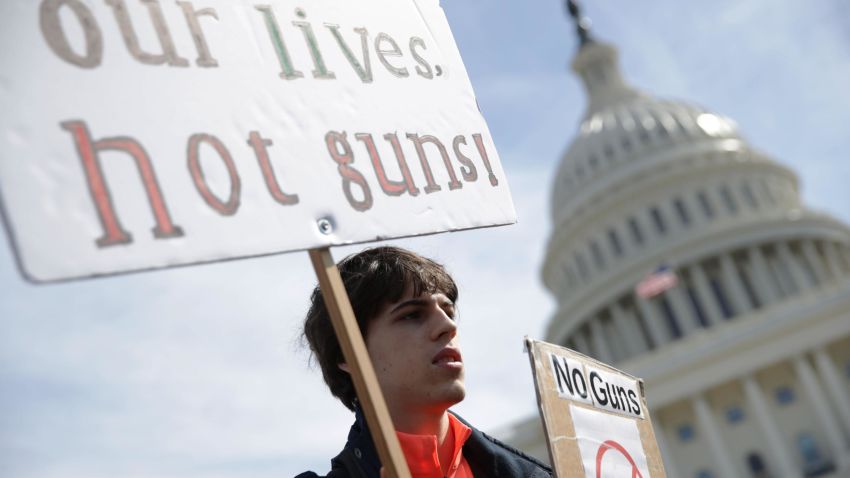 Student Maximilian Steubl of Churchill High School in Potomac, Maryland, participates in a gun control rally at the West Front of the U.S. Capitol March 14, 2019 on Capitol Hill in Washington, DC. Students from area high schools participated in the event to mark the one-year anniversary of a nationwide gun-violence walkout protest that was prompted by the shooting at Marjory Stoneman Douglas High School in Parkland, Florida.