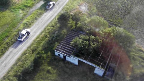 This image released by Mexico's Navy shows the site where 72 Central and South American migrants were found slain in 2010, less than 100 miles from the U.S. border.