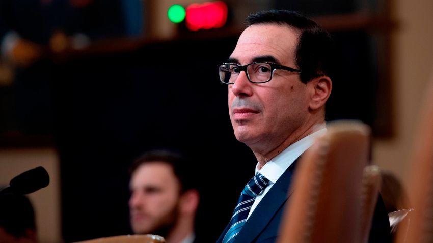 US Treasury Secretary Steven Mnuchin prepares to testify on "The President's FY2020 Budget Proposal"  before the House Ways and Means Committee on Capitol Hill in Washington, DC, on March 14, 2019. (Photo by Jim WATSON / AFP)        (Photo credit should read JIM WATSON/AFP/Getty Images)